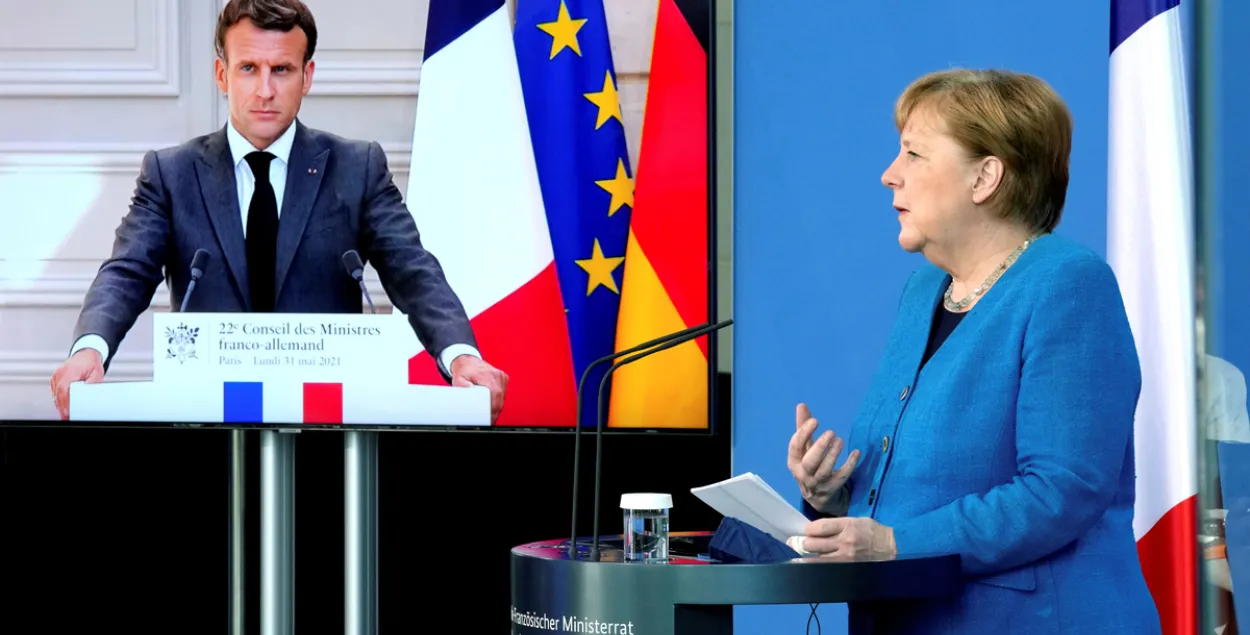 Эмманюэль Макрон и Ангела Меркель / Reuters